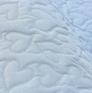 19mb OUTLET VELVET niebieski pikowany w Serduszka. Tkanina wyściółkowa Minky Plusz Materiał wyściółkowy